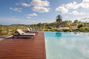 Outdoor pool, open 10:30 AM to 7:00 PM, pool umbrellas, sun loungers - Safragell Ibiza Suites & Spa (Sant Joan de Labritja)