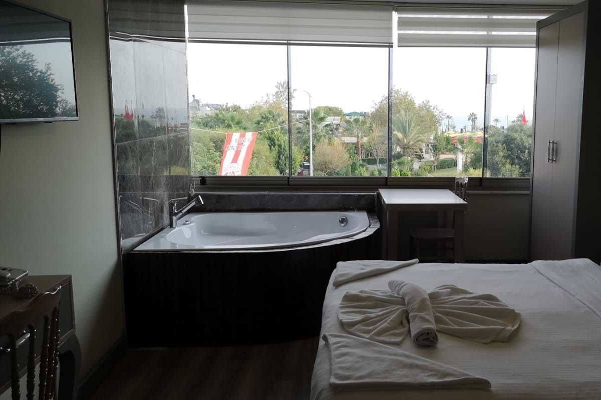 Suite estudio, vista al mar | Sábanas de algodón egipcio y ropa de cama de alta calidad 