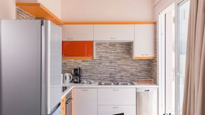Villa, 2 Bedrooms | Private kitchen | Fridge, microwave, oven, stovetop