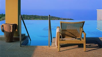 Indoor pool, outdoor pool, pool umbrellas, sun loungers