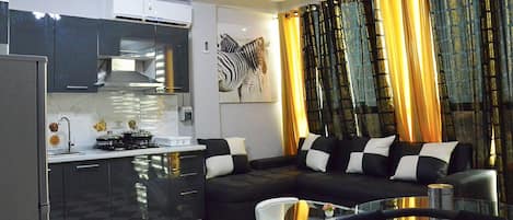 Appartement Exécutif | Cuisine privée | Réfrigérateur, micro-ondes, four, plaque de cuisson