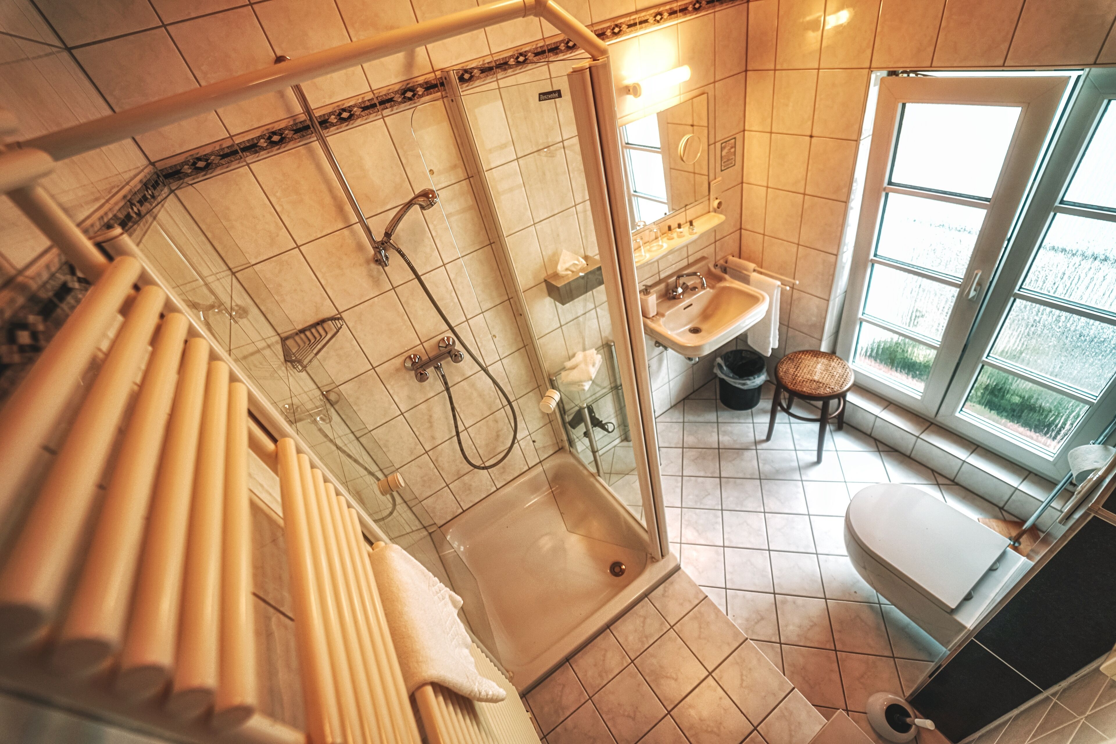 standard double room | bathroom | shower, free toiletries, hair dryer, towels