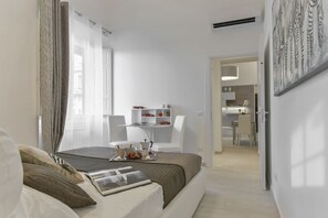 2 quartos, ferros/tábuas de passar roupa, Wi-Fi, roupa de cama