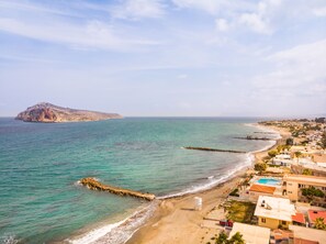 On the beach, sun loungers, beach umbrellas, beach towels