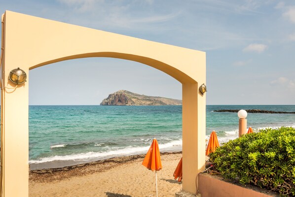 On the beach, sun-loungers, beach umbrellas, beach towels