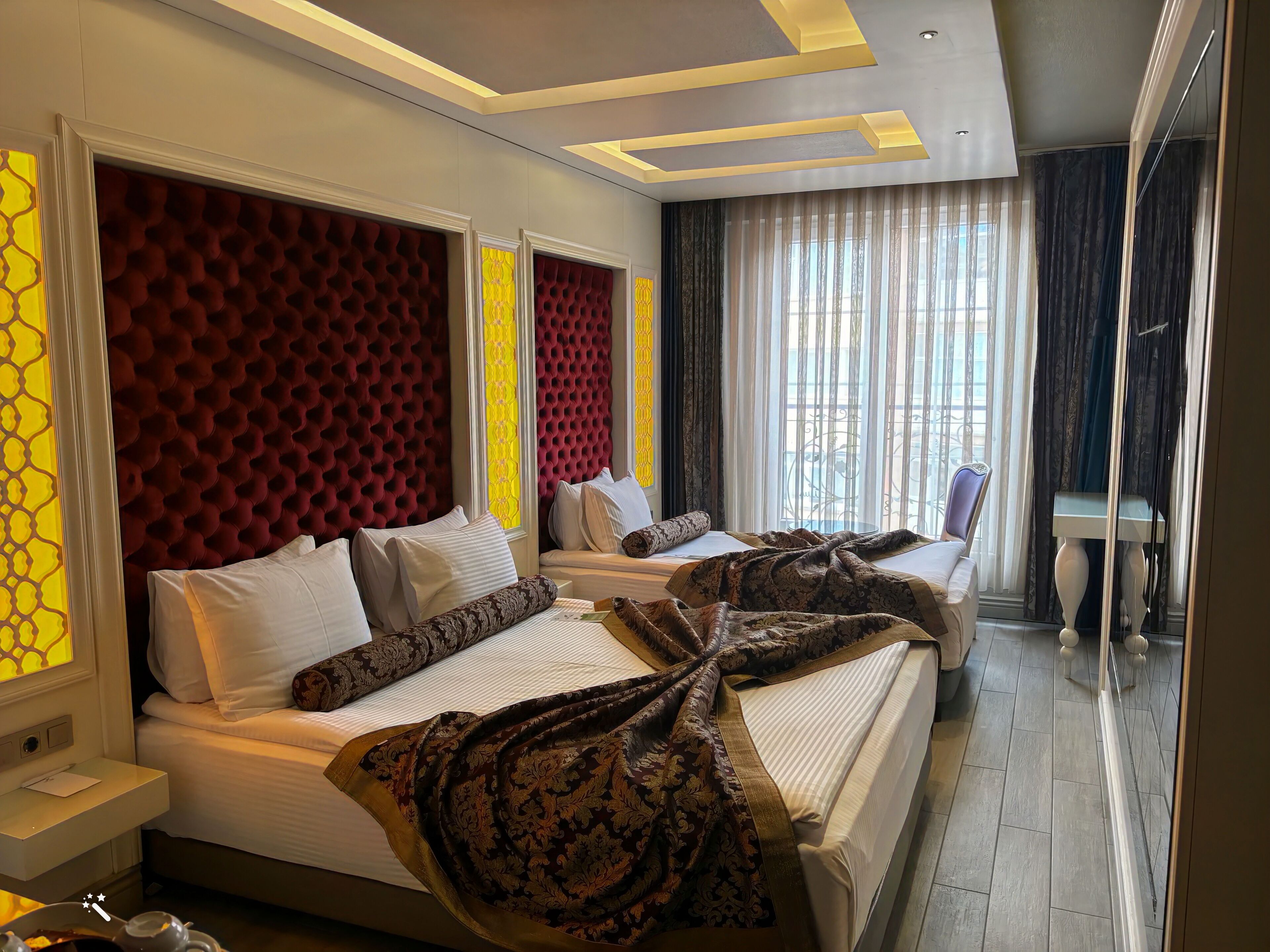 family twin room, multiple beds, city view | view from room