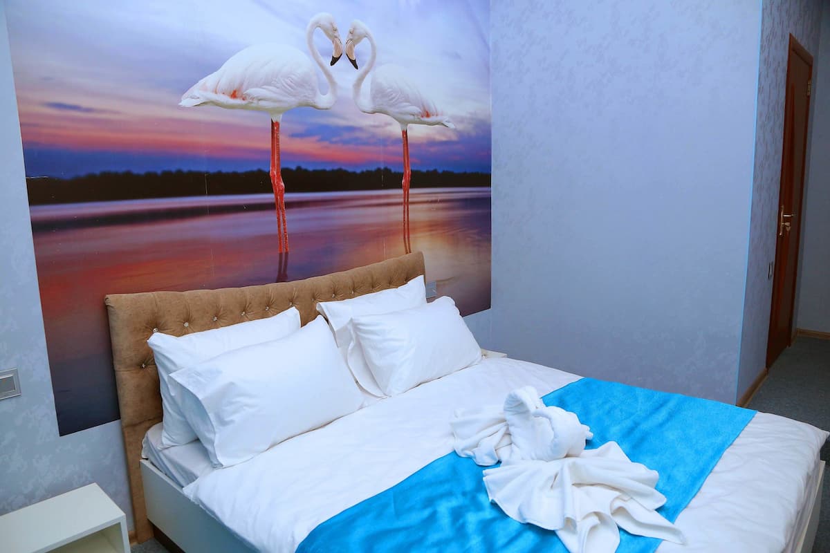 Ropa de cama de alta calidad y minibar
