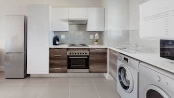 Luxury Apartment, 2 Bedrooms | Private kitchen | Full-sized fridge, microwave, oven, stovetop