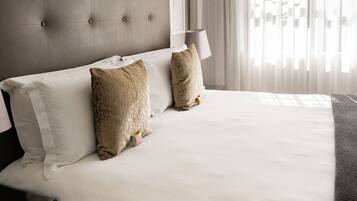 Premium bedding, in-room safe, blackout drapes, free WiFi
