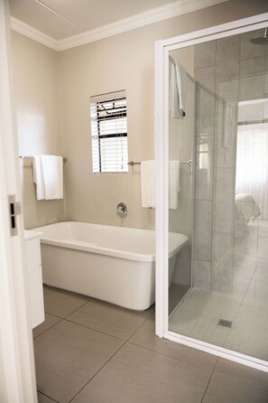 Deep soaking tub, rainfall showerhead, free toiletries, hair dryer