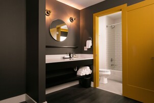 Combined shower/tub, hair dryer, towels, soap