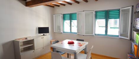 Studio, Stadtblick | Wohnbereich | Flachbildfernseher