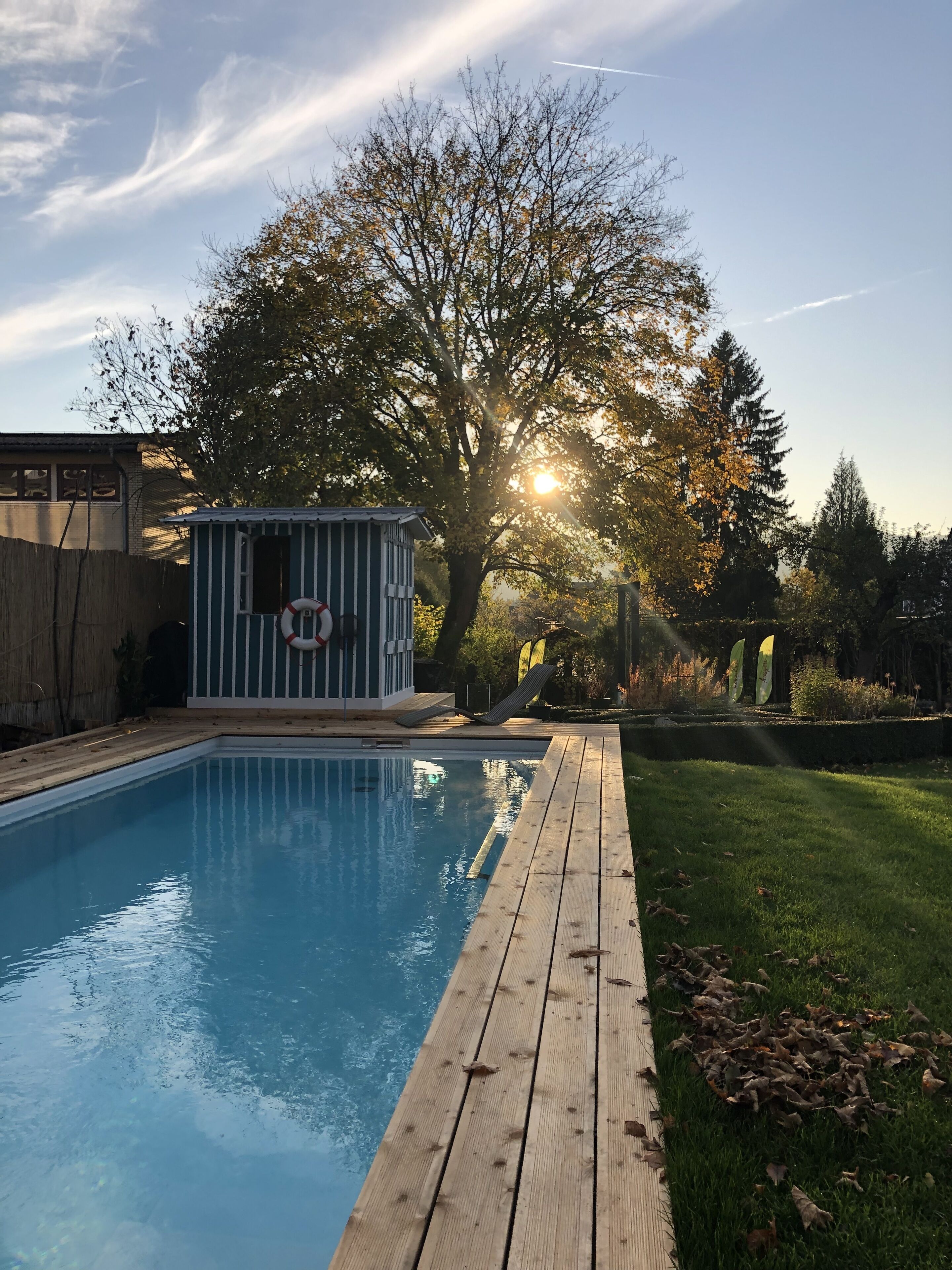 Outdoor pool, pool umbrellas, sun loungers