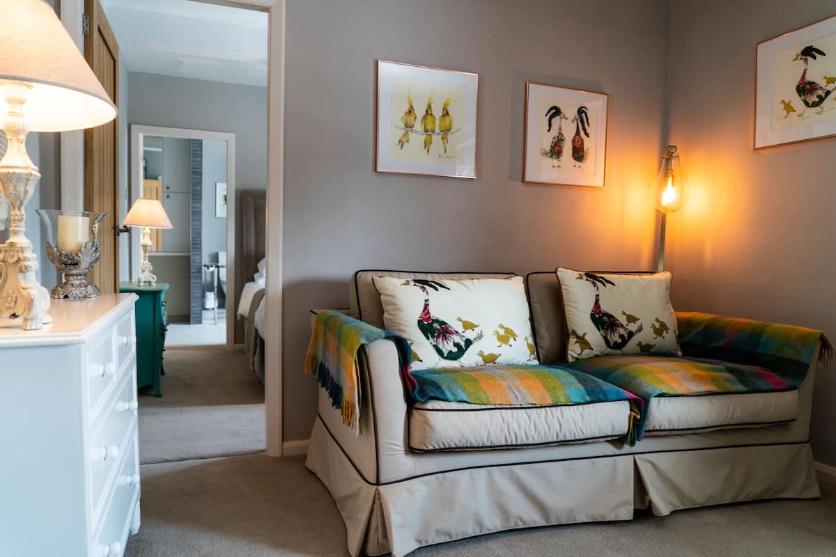 Junior Suite | 1 bedroom, blackout curtains, iron/ironing board, free WiFi