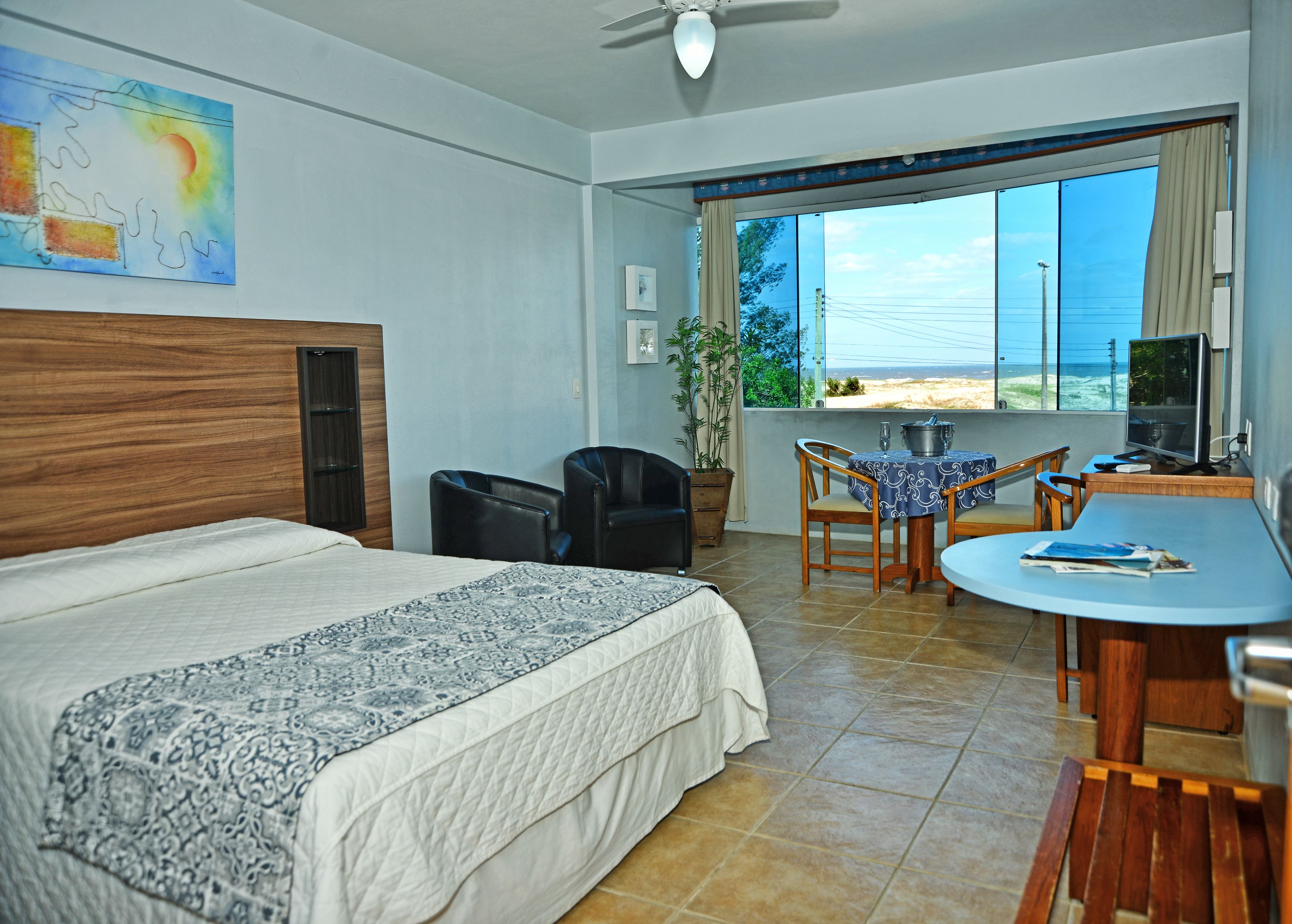 basic suite, 1 queen bed | 1 bedroom, minibar, in-room safe, desk