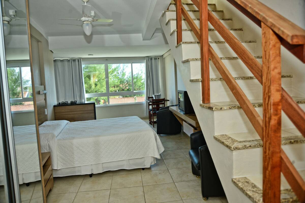 family loft, 1 queen bed | 1 bedroom, minibar, in-room safe, desk