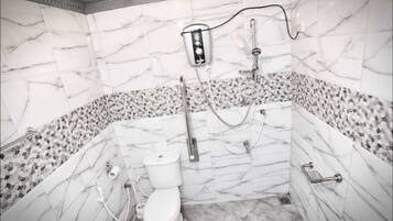 Shower, designer toiletries, slippers