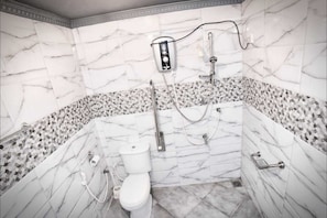 Shower, designer toiletries, slippers