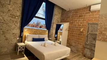 Family Apartment, 2 Bedrooms, Terrace | Iron/ironing board, free WiFi, bed sheets