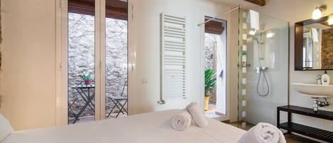 Down comforters, in-room safe, iron/ironing board, free WiFi