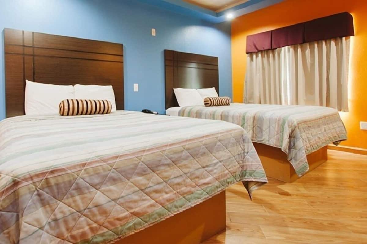 Room, 2 Queen Beds, Non Smoking | Desk, blackout curtains, iron/ironing board, free WiFi