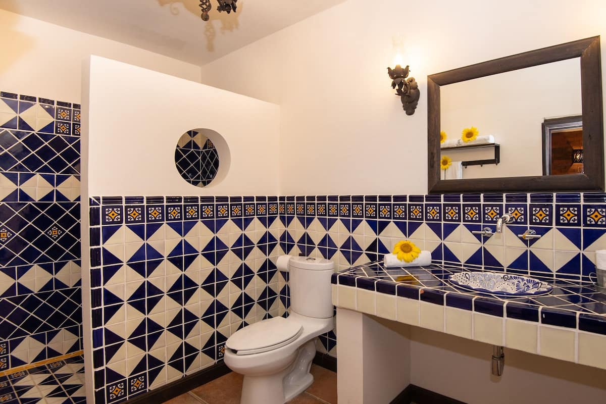 grand suite, 1 king bed, non smoking | bathroom | designer toiletries, hair dryer, towels