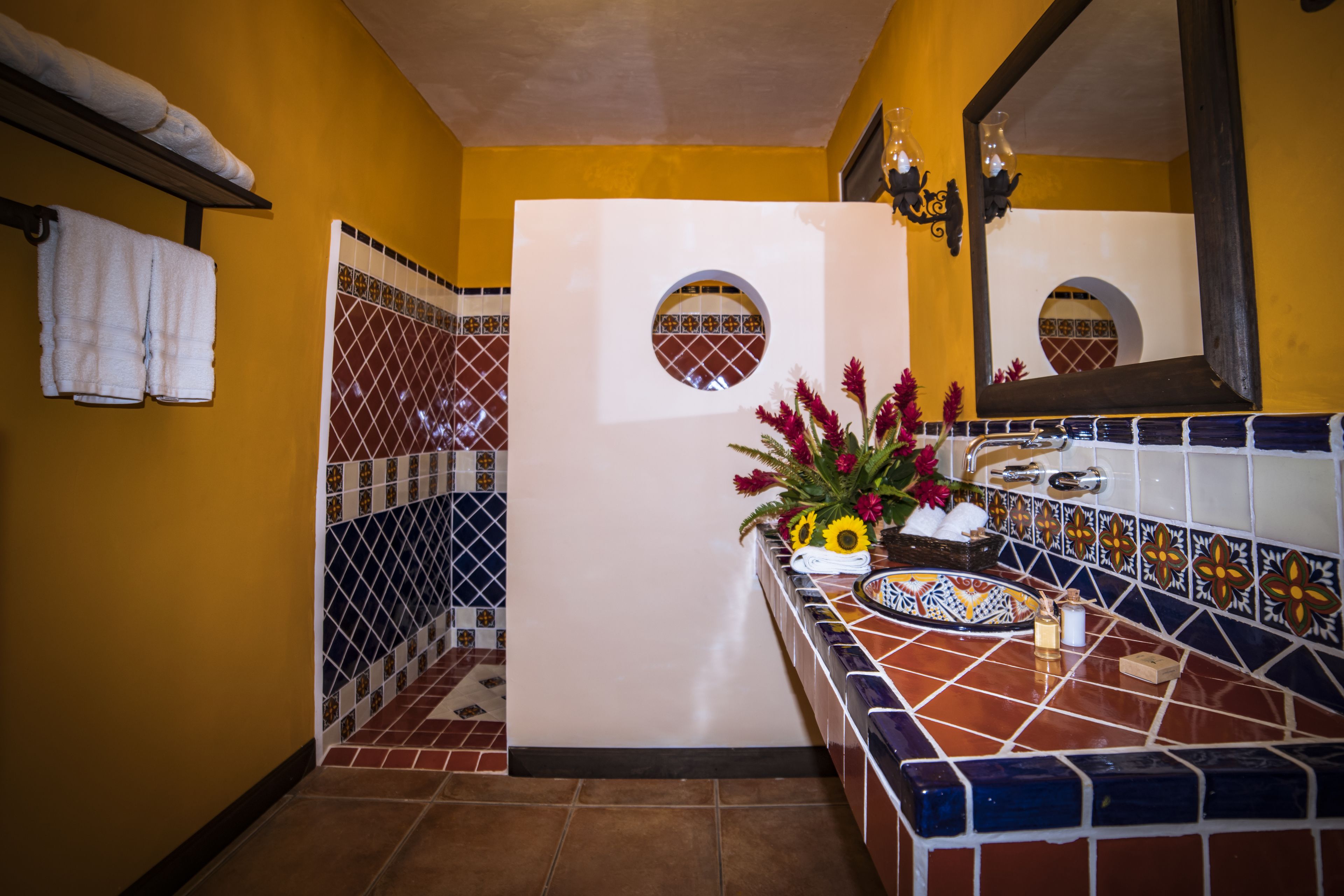 deluxe triple room, multiple beds, non smoking | bathroom | designer toiletries, hair dryer, towels