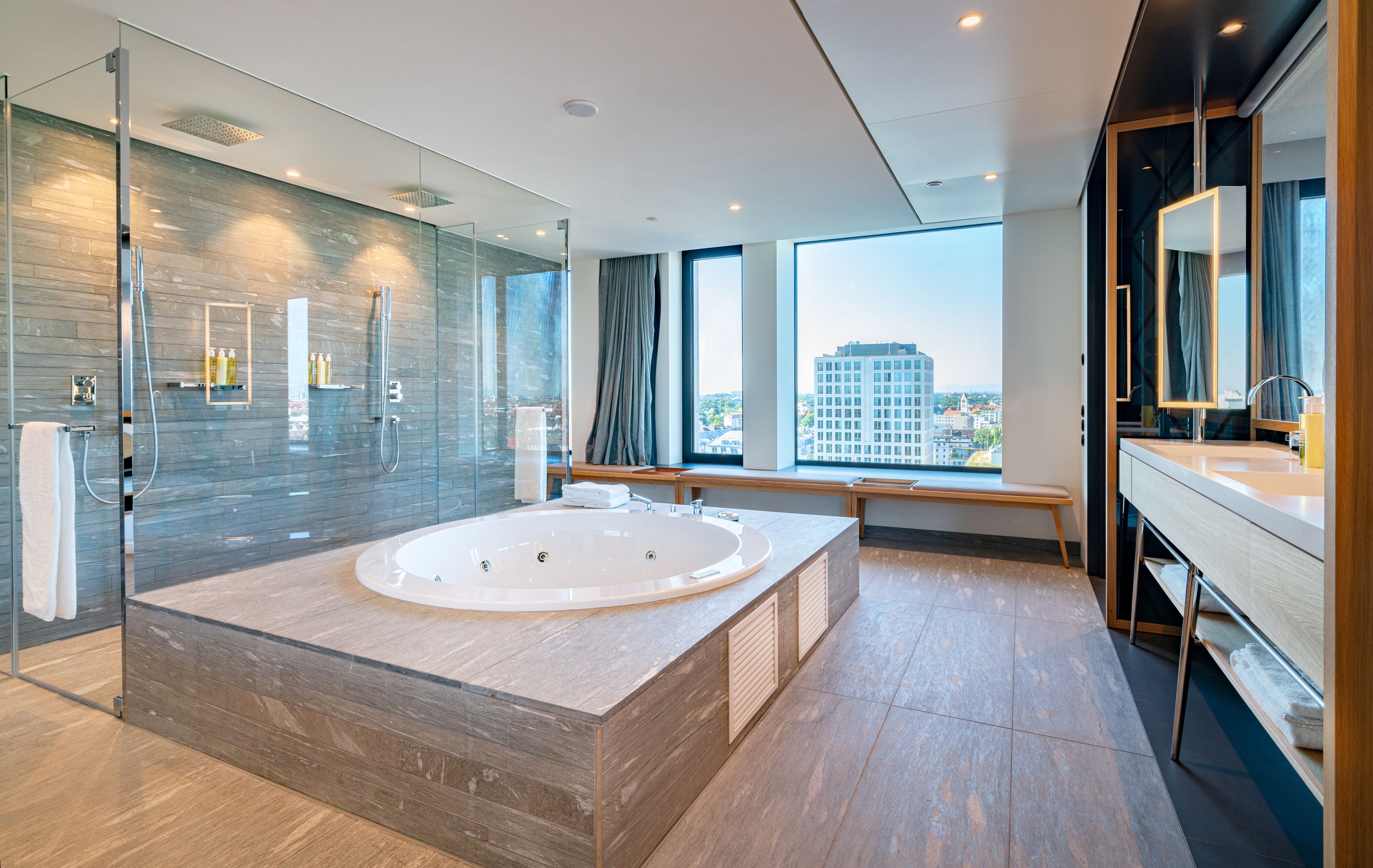 penthouse | bathroom | shower, rainfall showerhead, designer toiletries, hair dryer