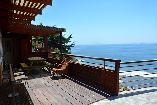 The Brown House, in front of the Ocean next to the beach and waves at La Boca
