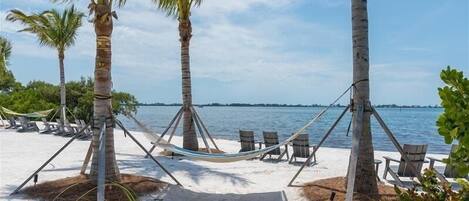 On the beach, sun-loungers, beach towels