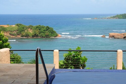 Luxury private beachfront villa with spectacular views