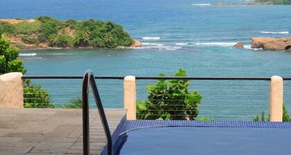 Luxury private beachfront villa with spectacular views