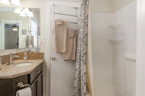 Hair dryer, towels, soap, shampoo