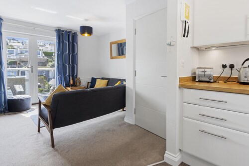 A modern and cosy apartment just yards from Brixham’s bustling harbourside