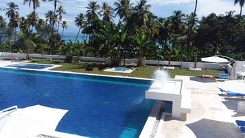Outdoor pool, pool umbrellas, sun loungers