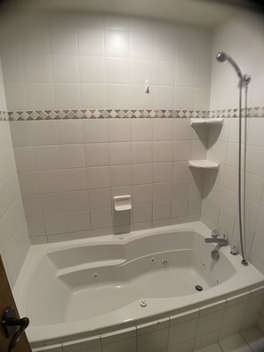 Combined shower/tub, jetted tub, hair dryer, towels - Buttes Condo, Steps from the base area, Mountain Luxury (Crested Butte)