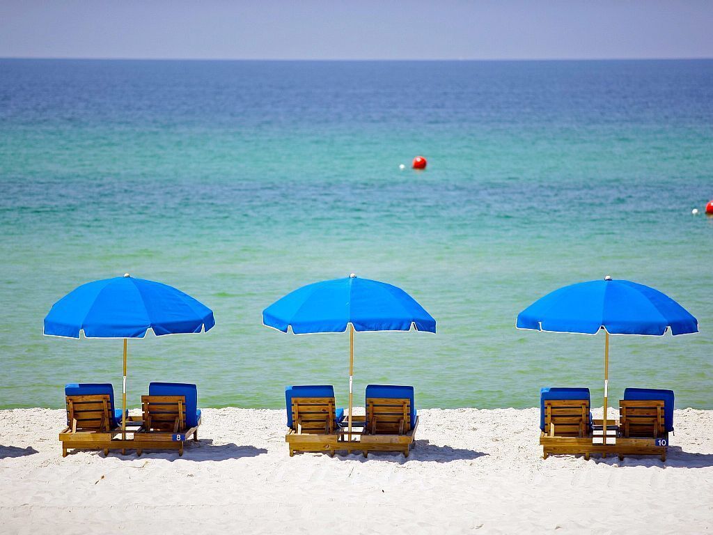 On the beach, sun-loungers, beach towels