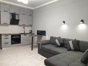 Premium-Apartment | Wohnzimmer | Plasmafernseher