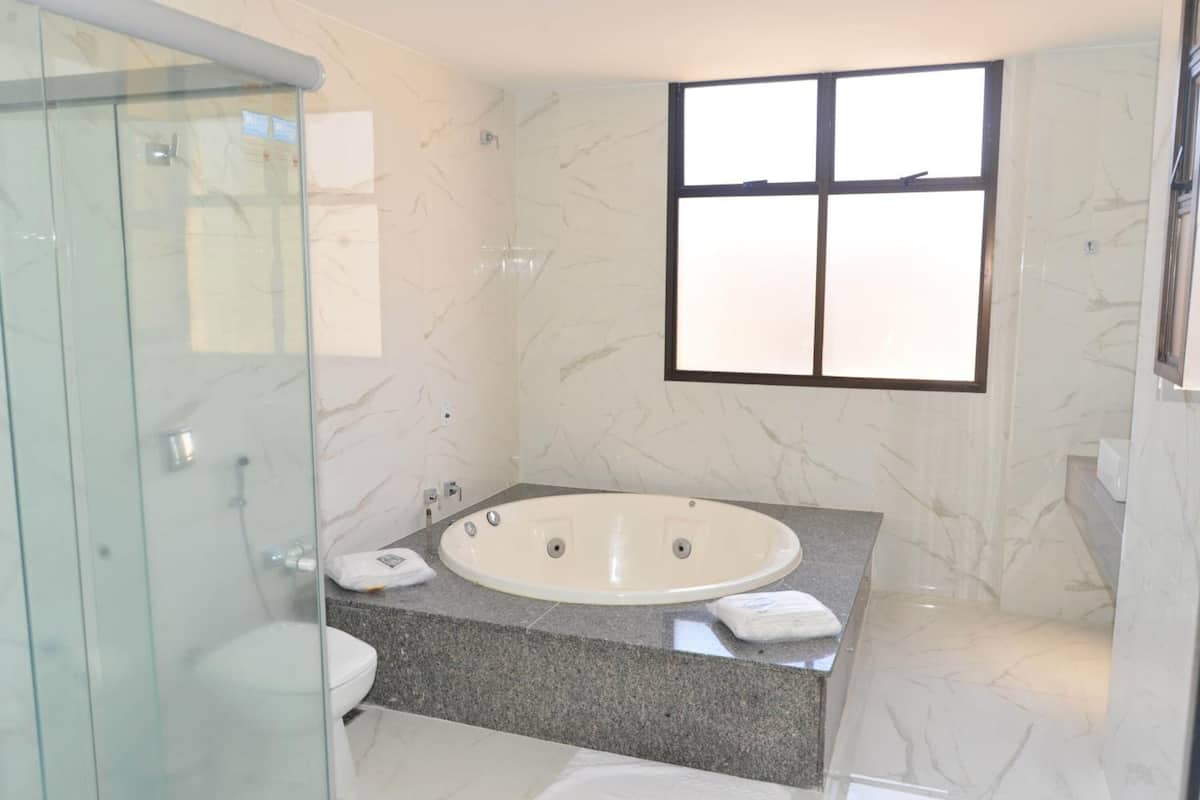 shower, rainfall showerhead, towels