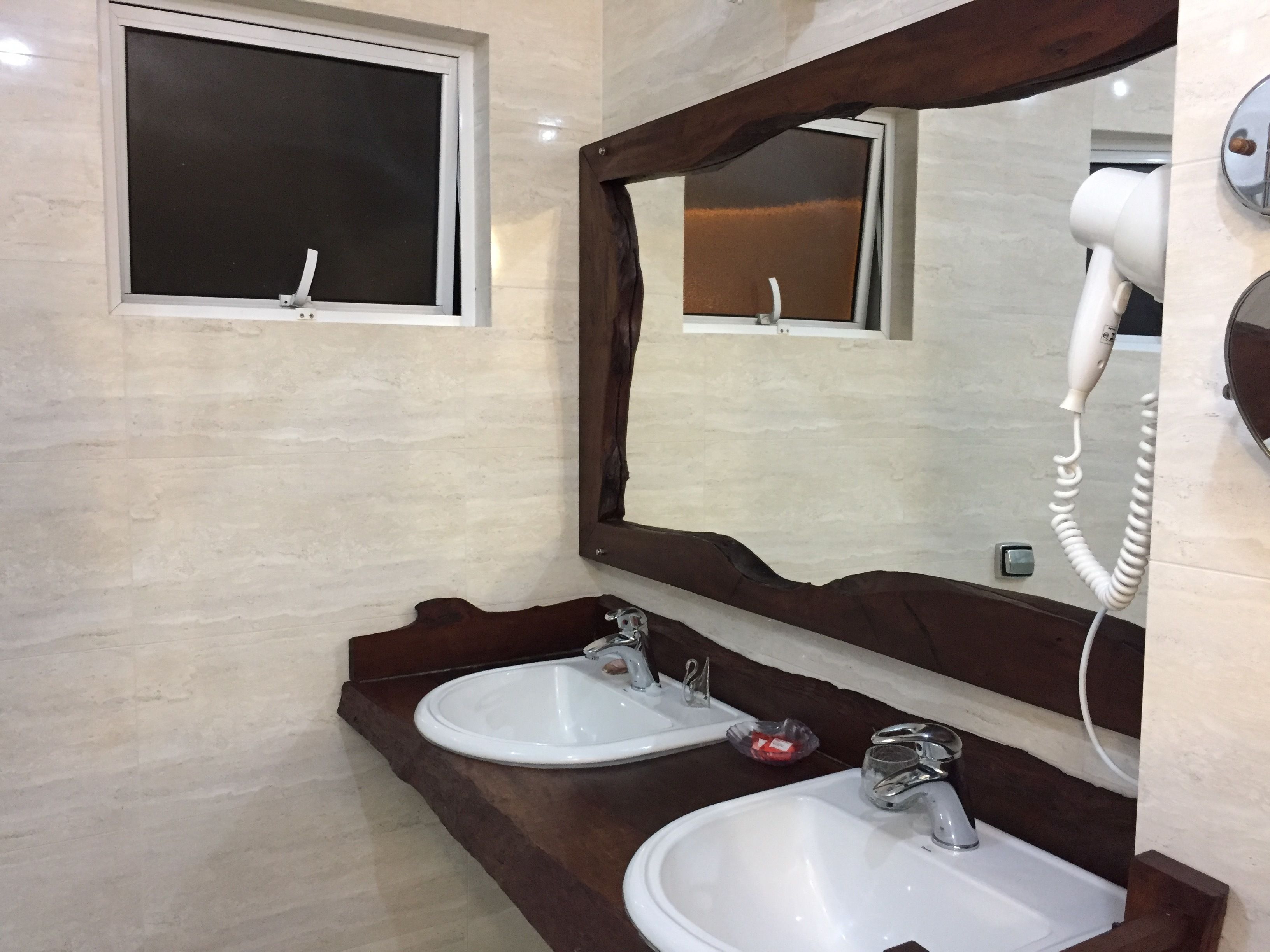 luxury suite, bathtub | bathroom amenities | hair dryer, towels