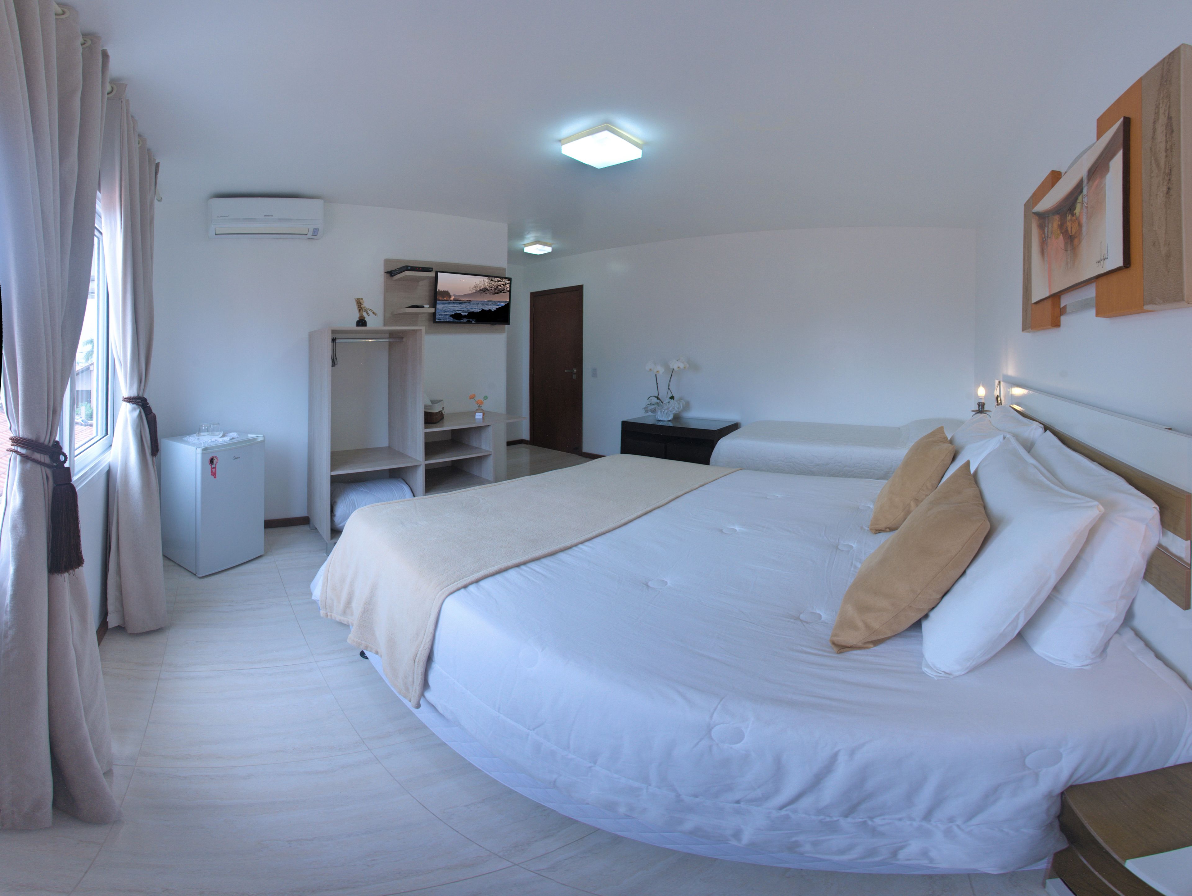 deluxe double room | minibar, desk, blackout curtains, iron/ironing board