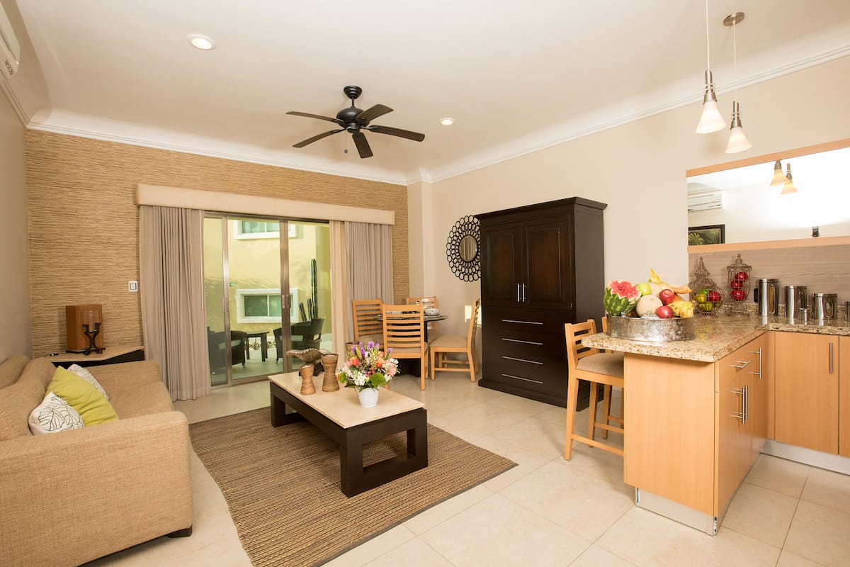 Superior Suite, 2 Queen Beds, Non Smoking, 2 Bathrooms | Living room | Flat-screen TV