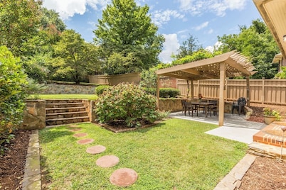 Historic Beauty: 5BR Home with Yard Near Hospital