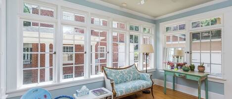 TV, fireplace, books