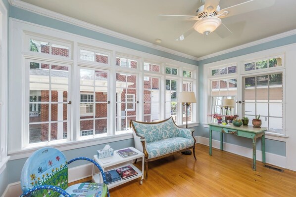 TV, fireplace, books
