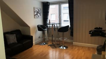 Flat-screen TV, video-game console, DVD player