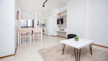 Apartment, Multiple Beds, Non Smoking | Living room | 32-inch LED TV with cable channels, TV