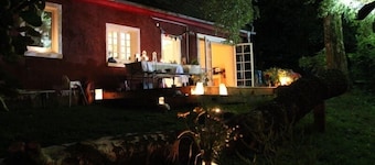 Maison Roltes dans le jardin verdoyant