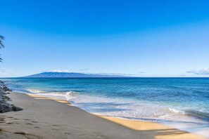 On the beach, sun-loungers, beach towels