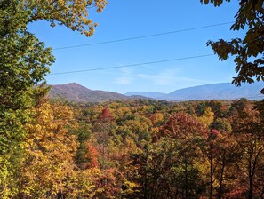 A mountainous landscape with autumn foliage and power lines. - B's Nest a Private & Clean w Mtn Views & Hot Tubs! (Sevierville)